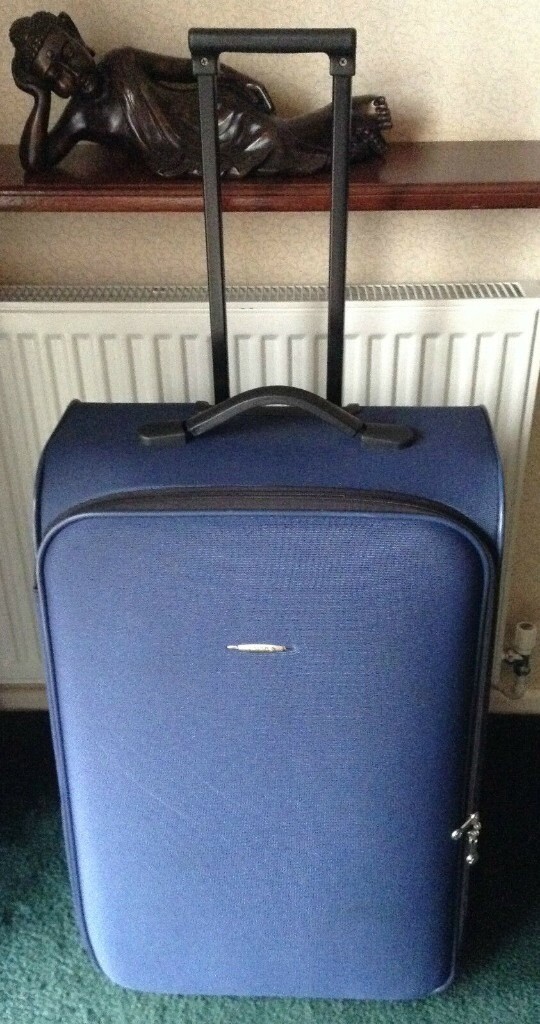 tripp large hard shell suitcase